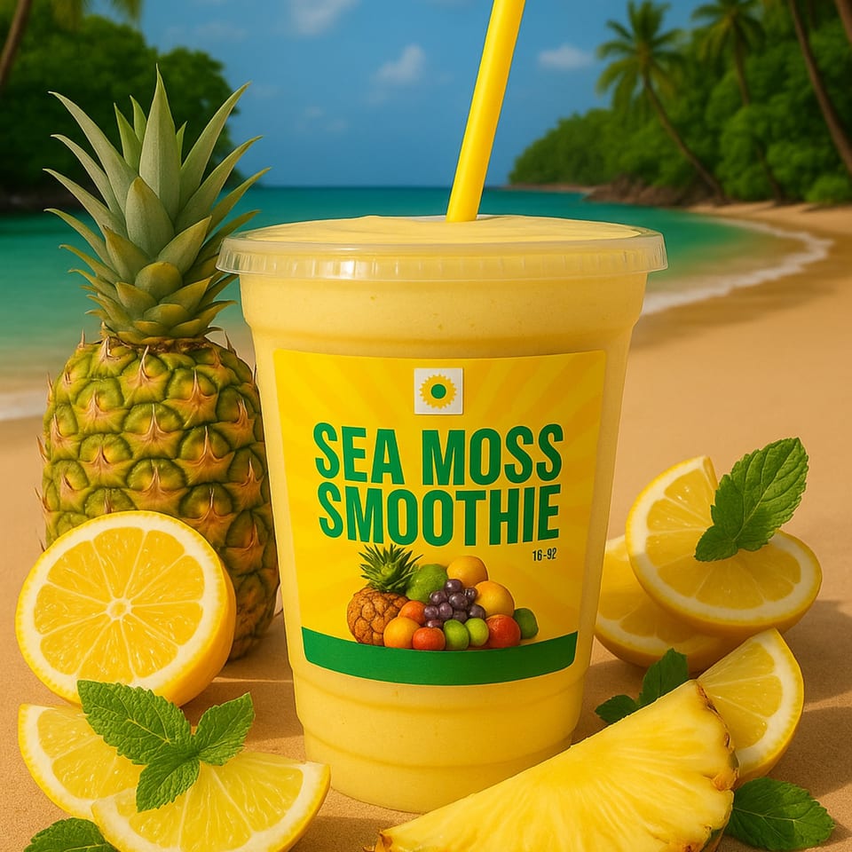 Sea Moss Smoothie with pineapple, lemons, and mint on a beach with palm trees.